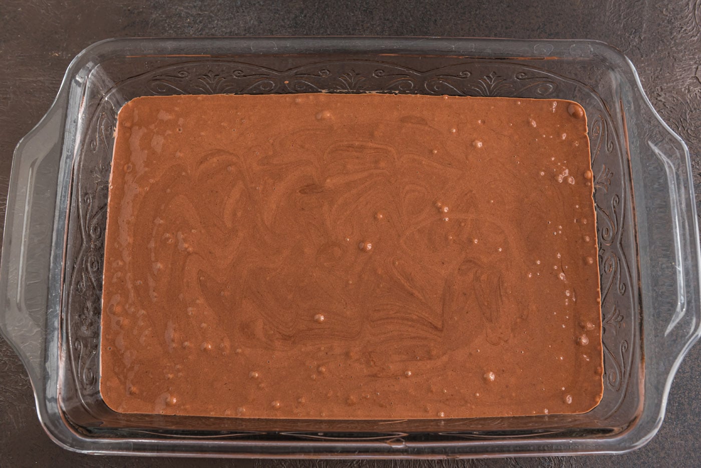 prepared devils food cake mix in a baking dish