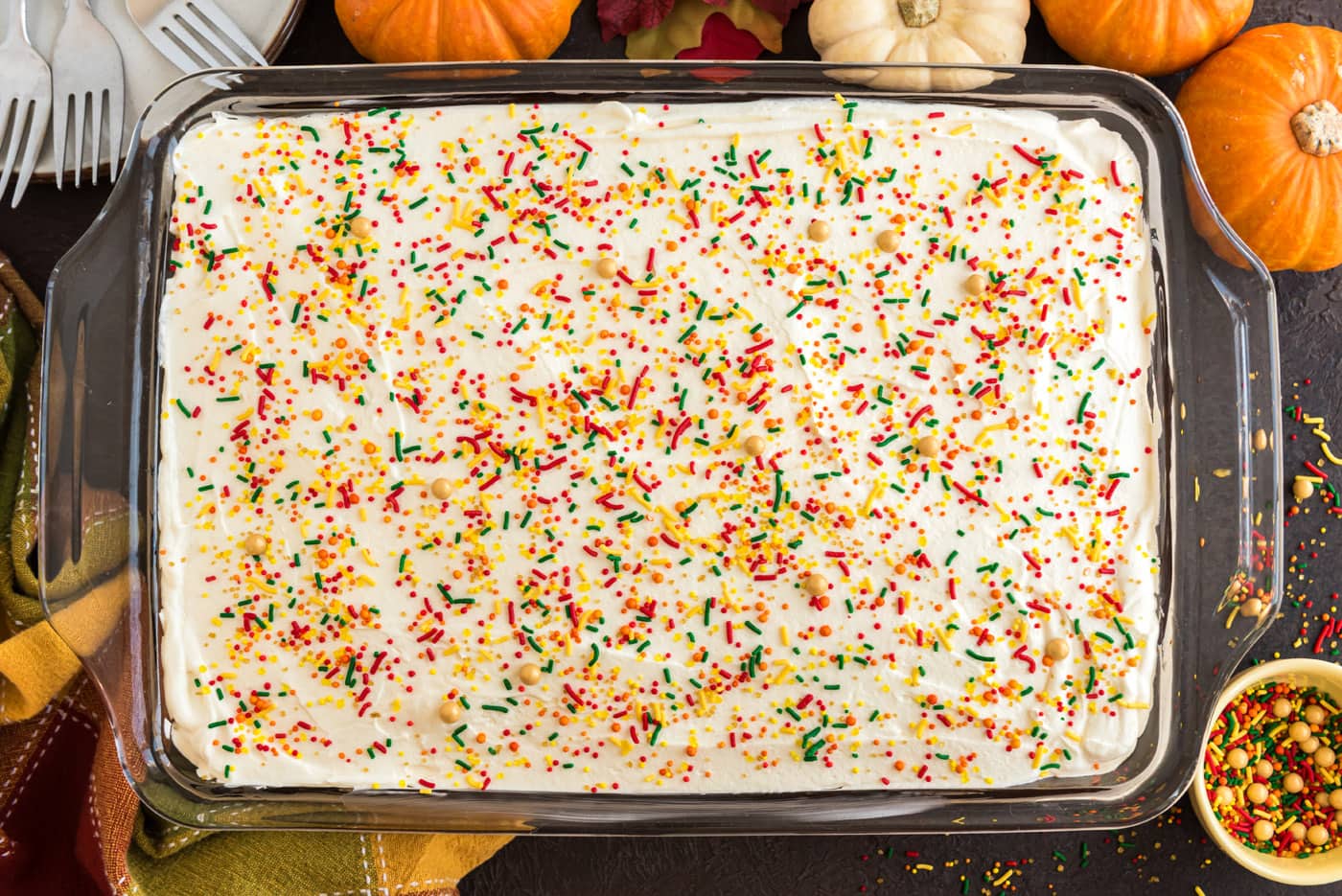 chocolate pumpkin magic cake decorated with fall sprinkles
