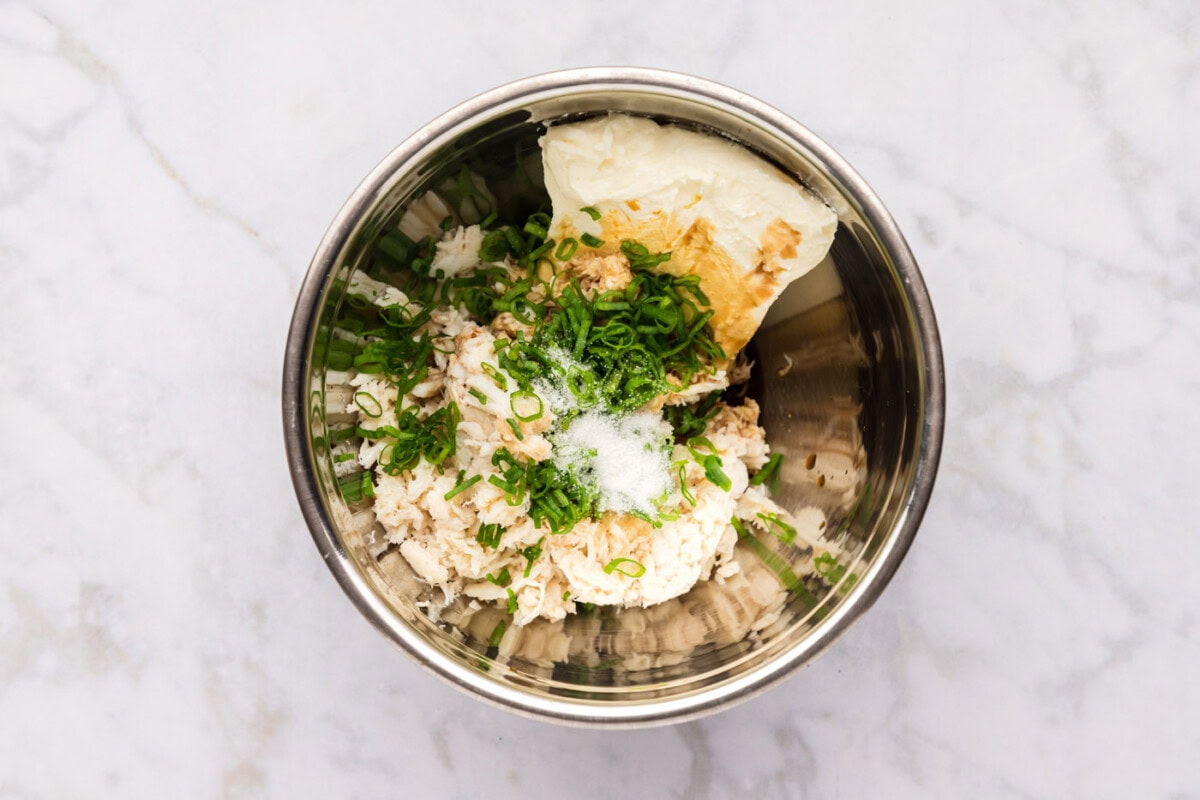 crab rangoon filling ingredients in a mixing bowl