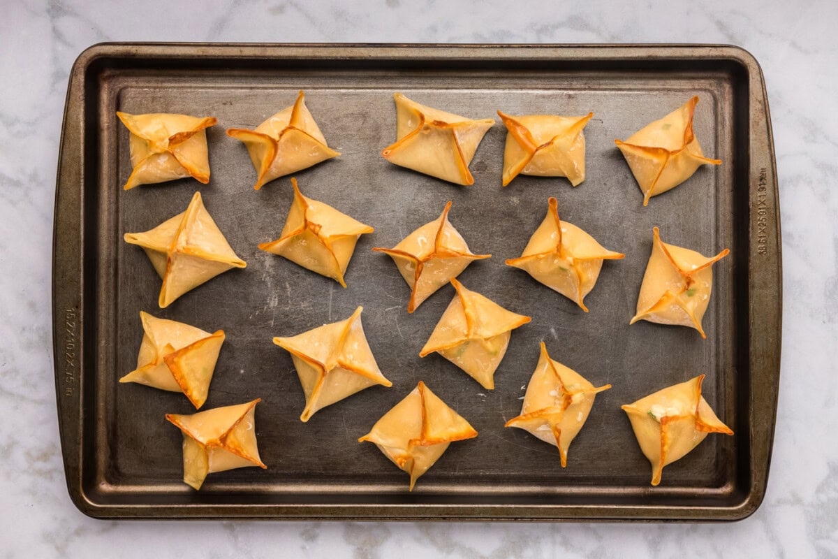 easy baked crab rangoon on a baking sheet