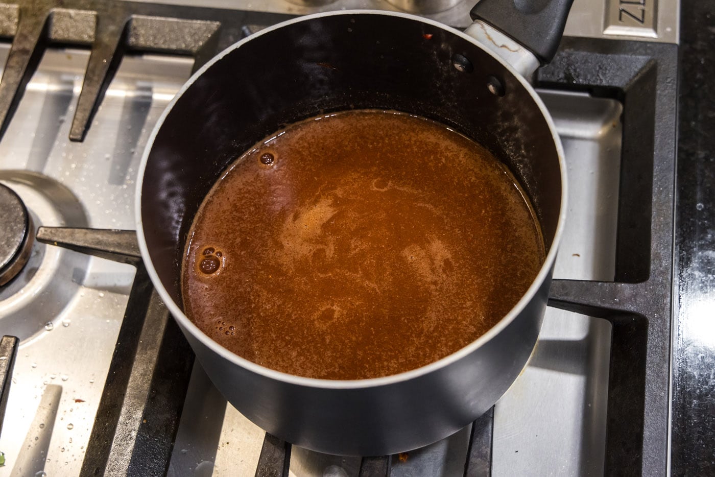 Dr. Pepper barbecue sauce in a saucepan