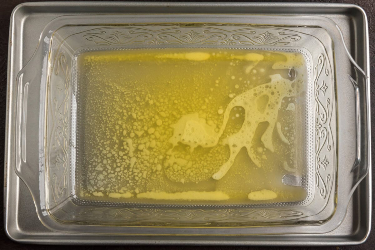 melted butter in baking dish