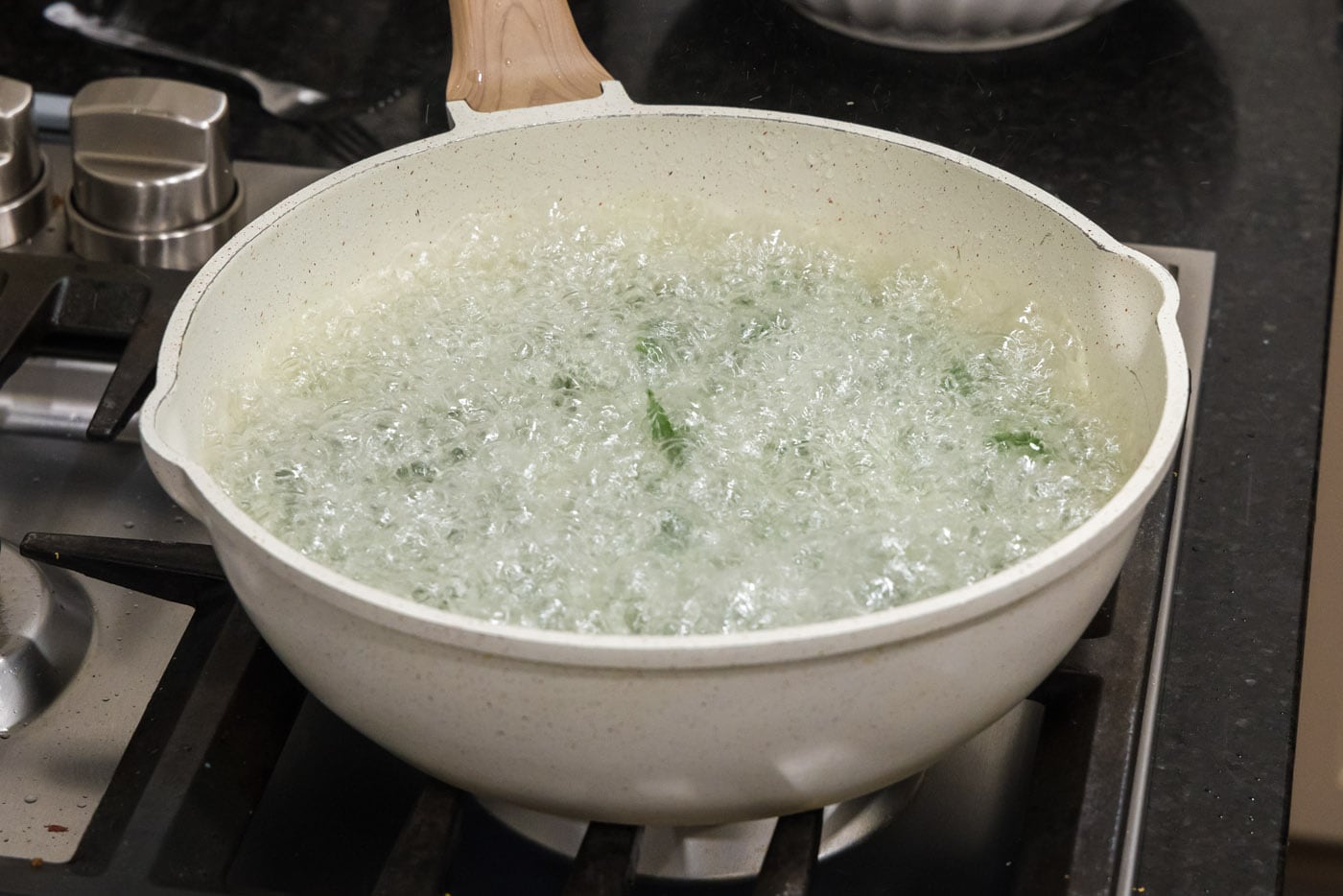 frying spinach in oil
