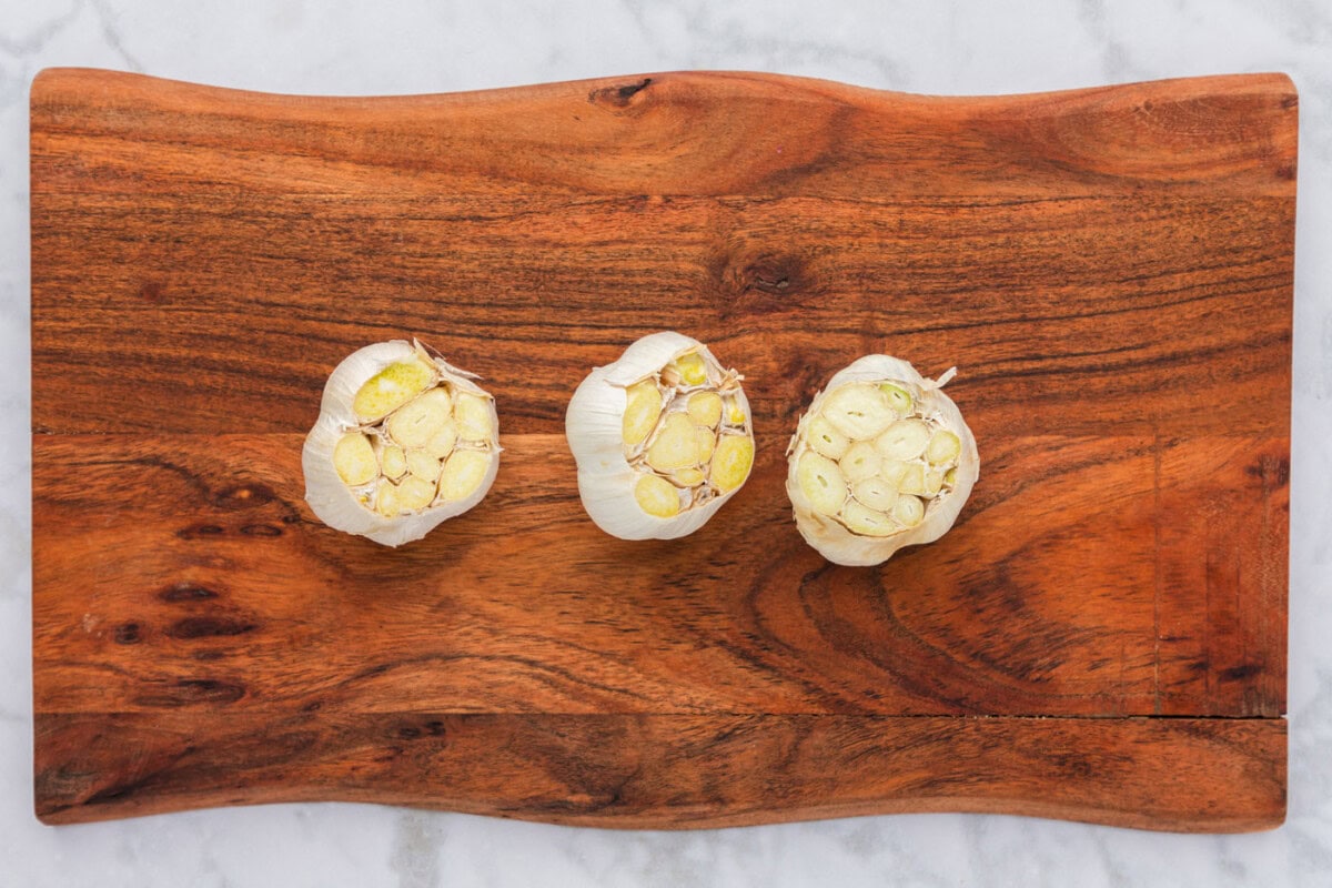 garlic bulbs with the tips sliced off