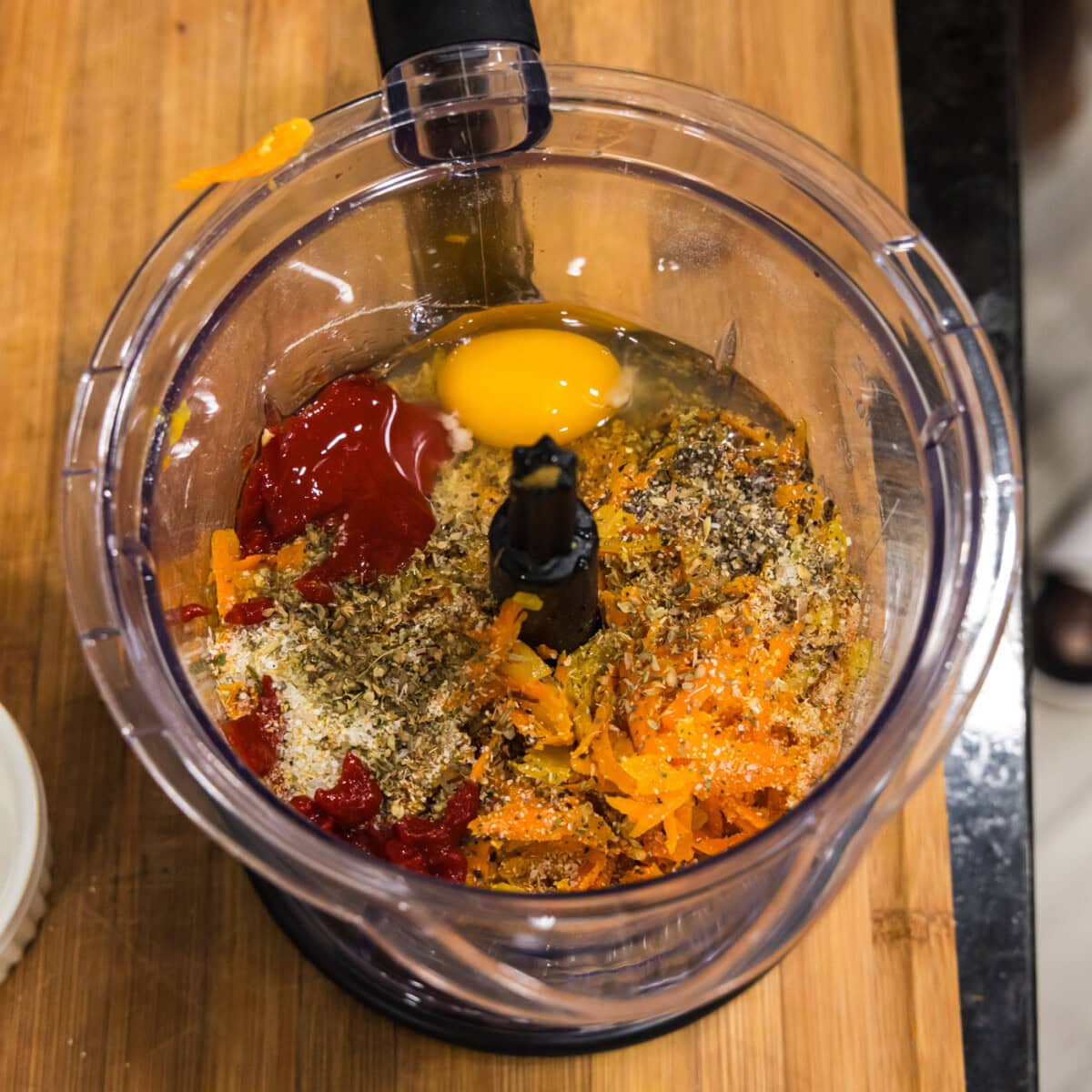 lentil meatball ingredients added to a food processor