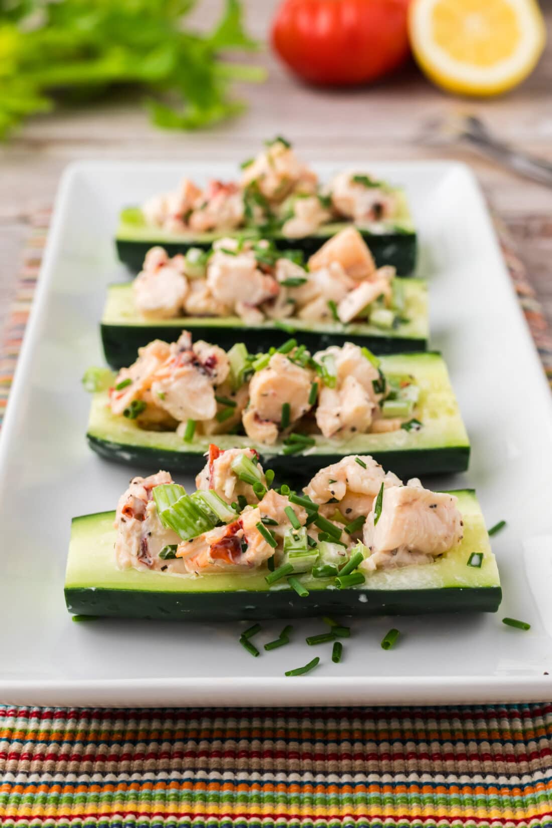 Four Lobster Cucumber Boats on a serving platter