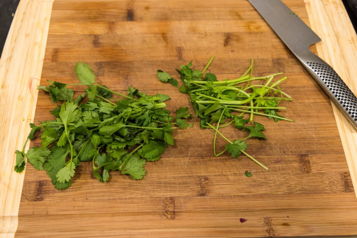cilantro cut in half on cutting board