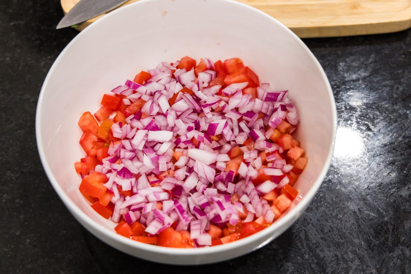 chopped tomatoes with diced red onion