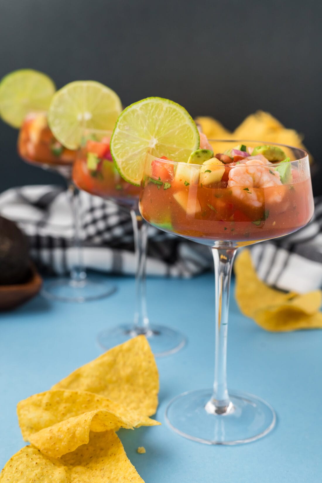 Three Mexican Shrimp Cocktails lined up on a table