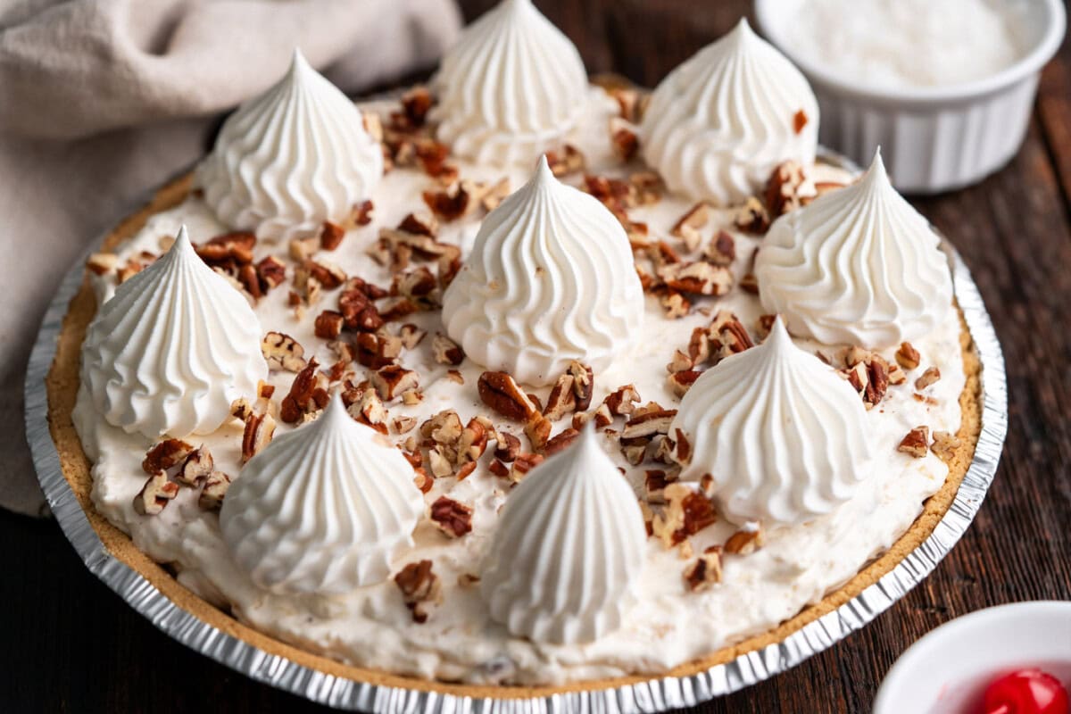 piped cool whip rosettes on top of pie