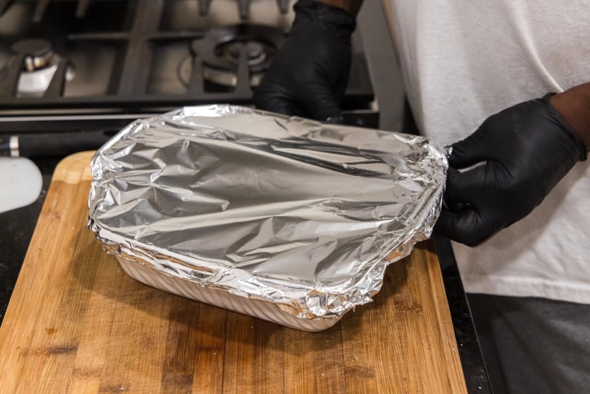 scalloped potatoes covered with aluminum foil