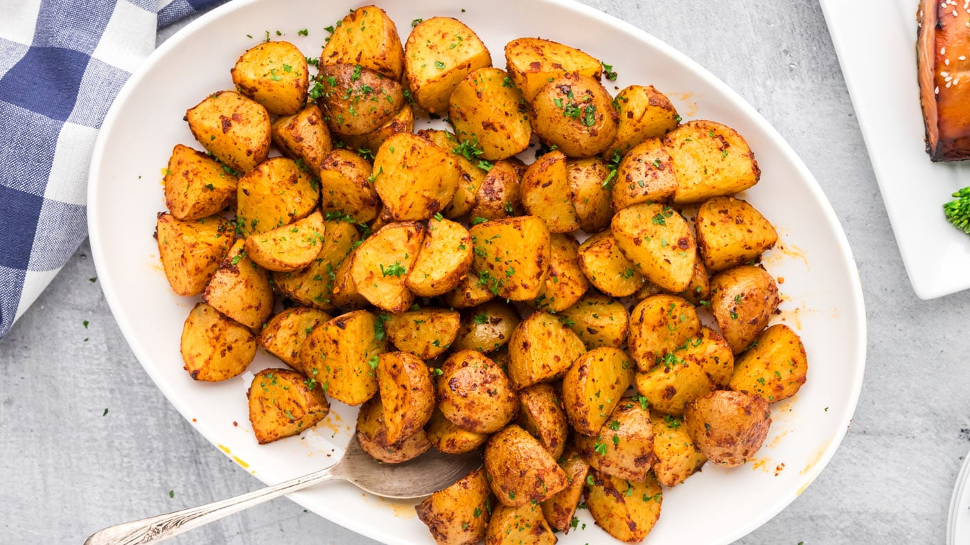 Soft, fluffy potatoes with a crisp seasoned exterior create the perfect texture balance in these spi