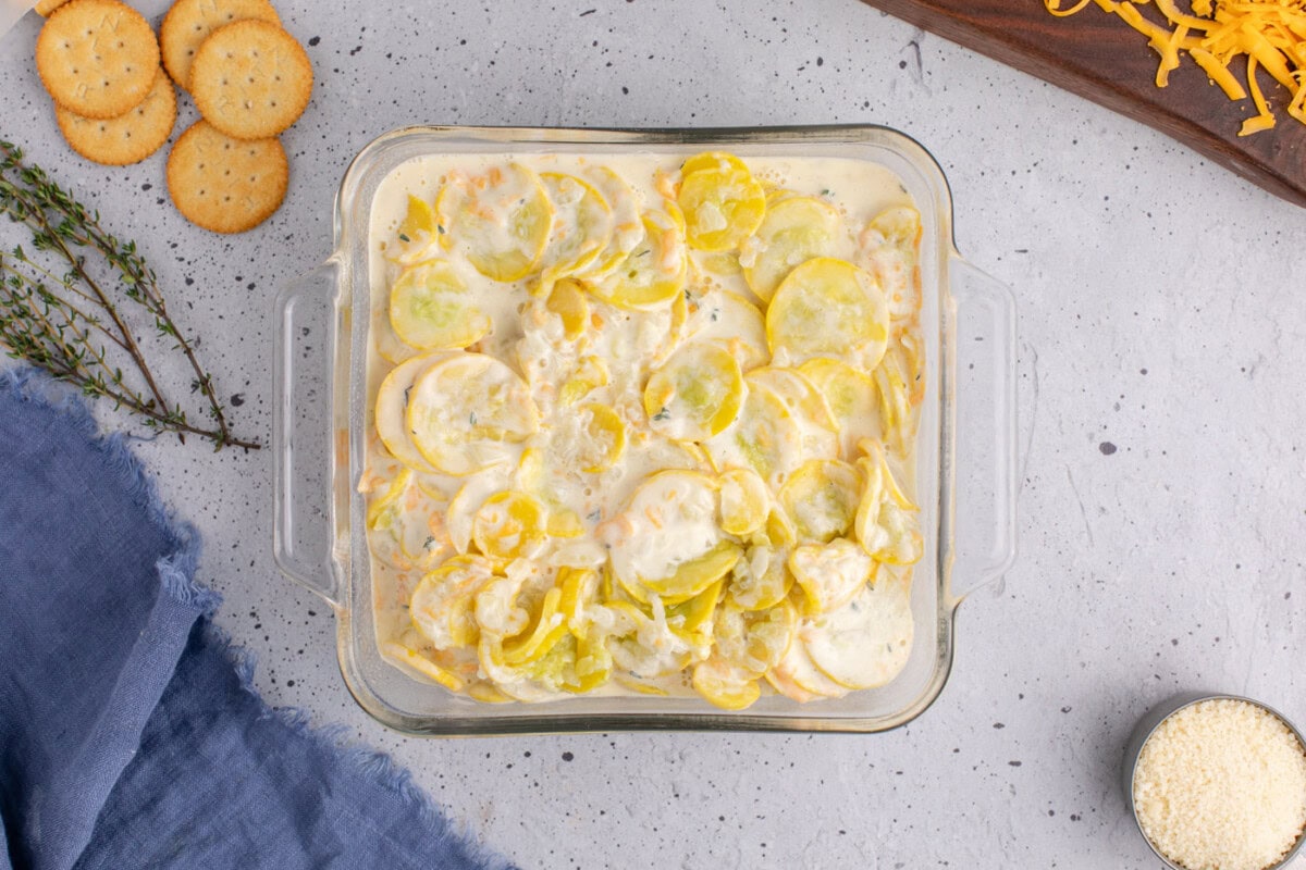 yellow squash with filling in a baking dish