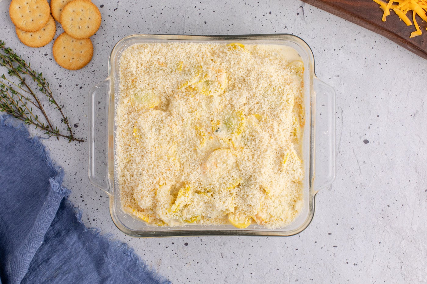 parmesan cheese on top of squash casserole