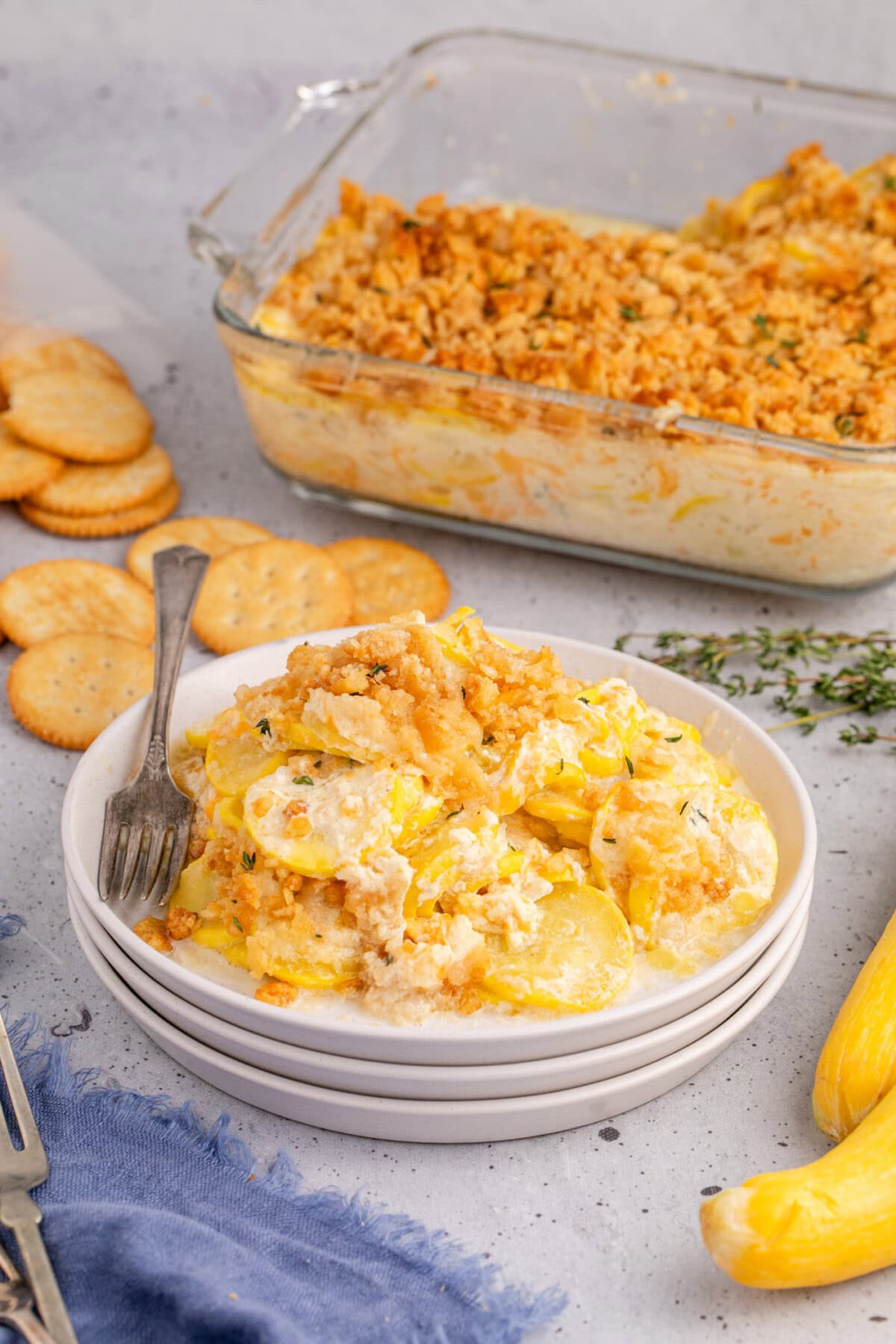 Squash Casserole on a plate with a fork