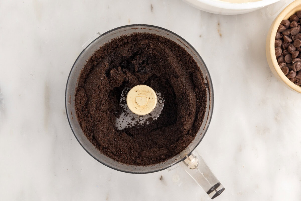 blended Oreo cookies in a food processor