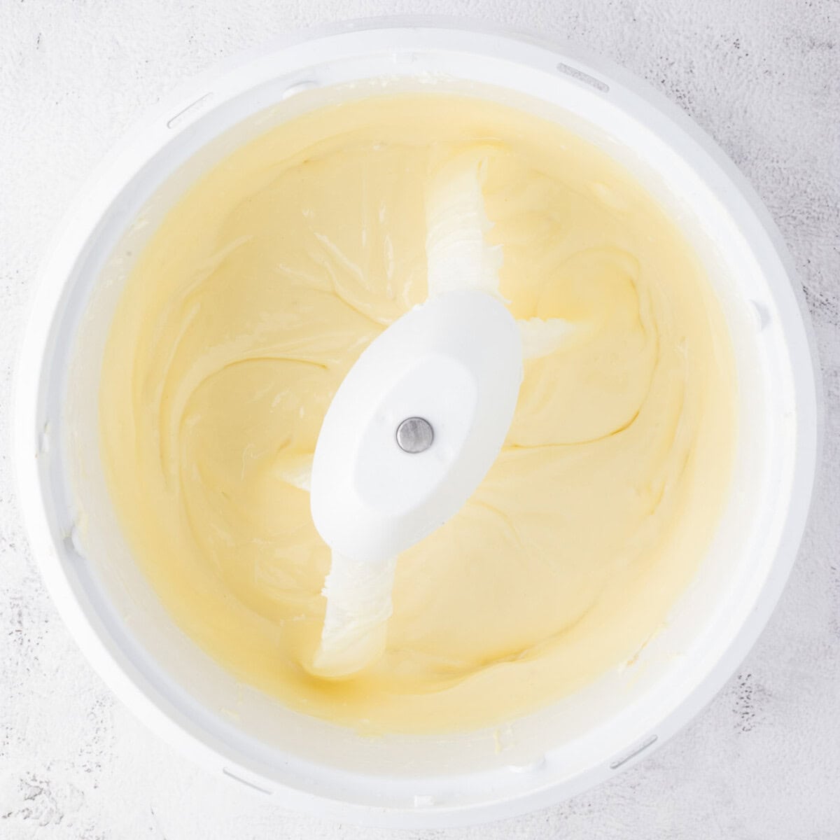 cheesecake batter in a mixer bowl