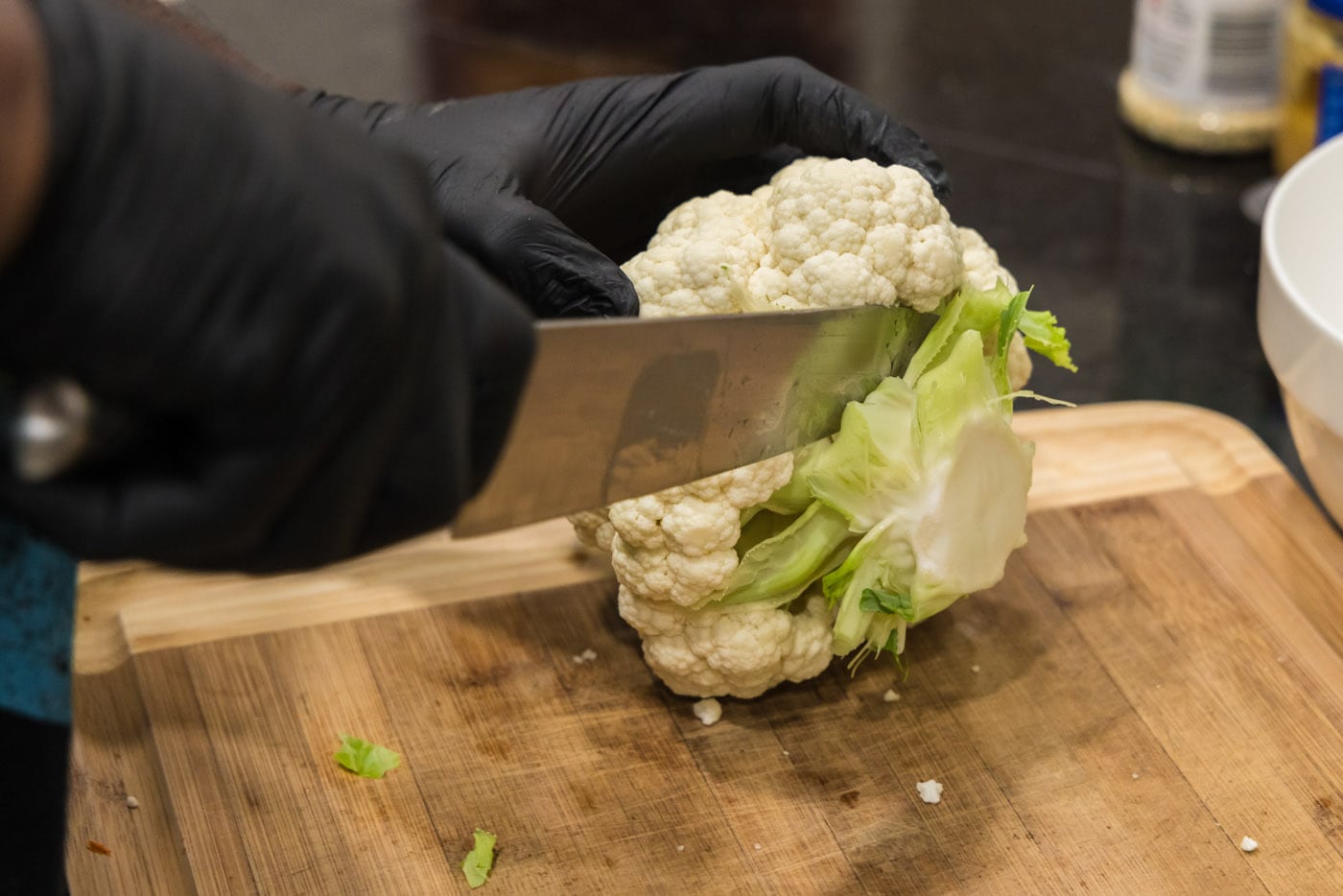 Slicing cauliflower with a chefs knife