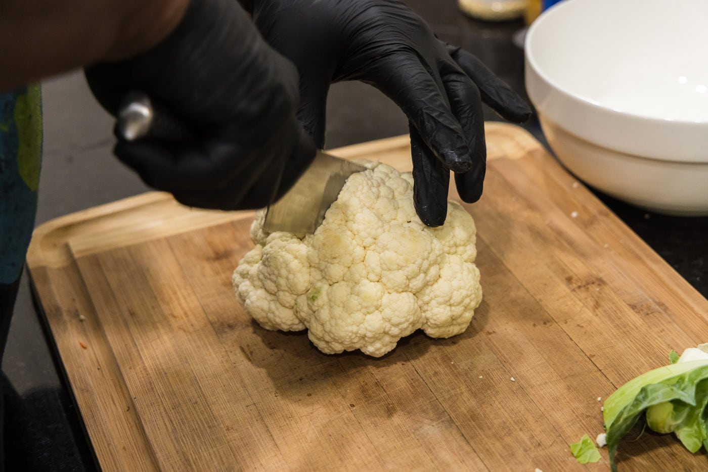 slicing head of cauliflower
