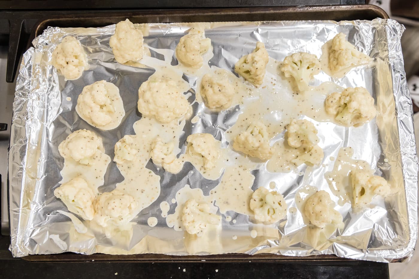 cauliflower dredged in flour coating