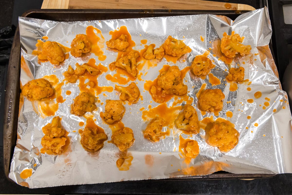 buffalo cauliflower on baking sheet