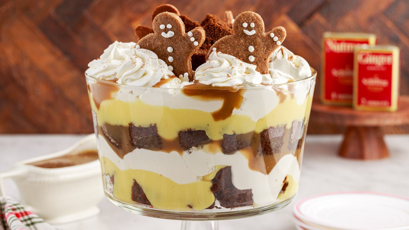 Gingerbread trifle has 3 main layers of pudding, whipped cream, and gingerbread cake with caramel sa