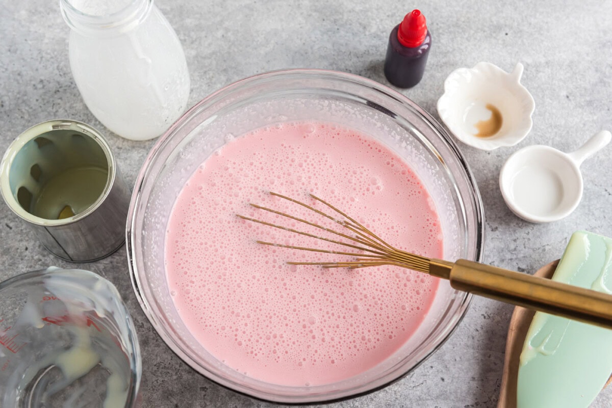 whisking ice cream ingredients in a bowl