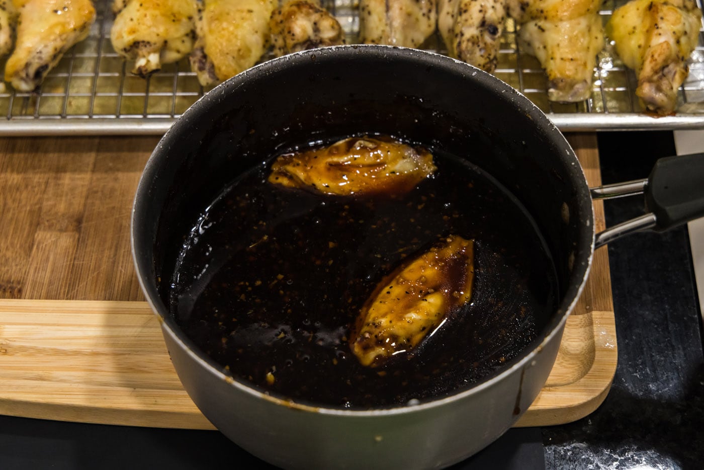 coating wings in honey garlic sauce