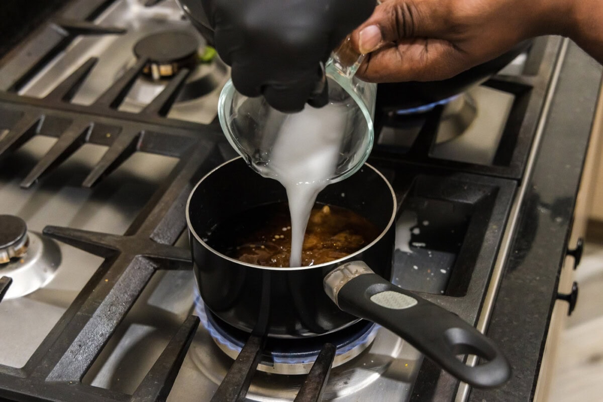 adding cornstarch slurry to kung pao sauce