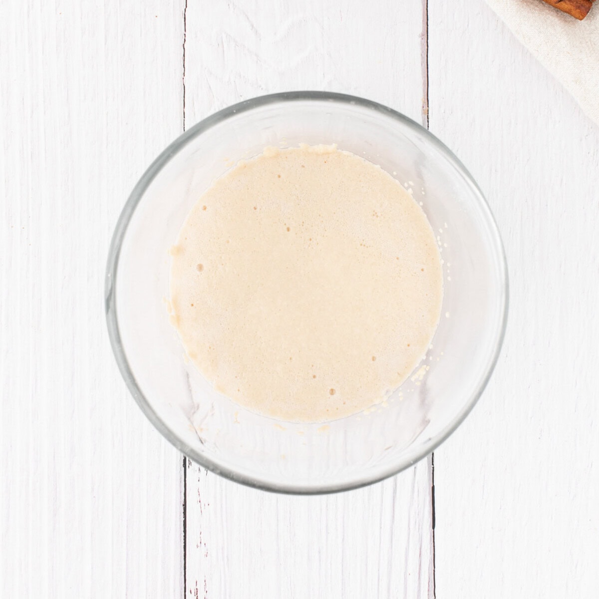 active dry yeast in a bowl with sugar and warm water