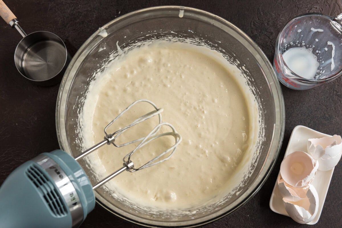 cake batter in a bowl of a mixer