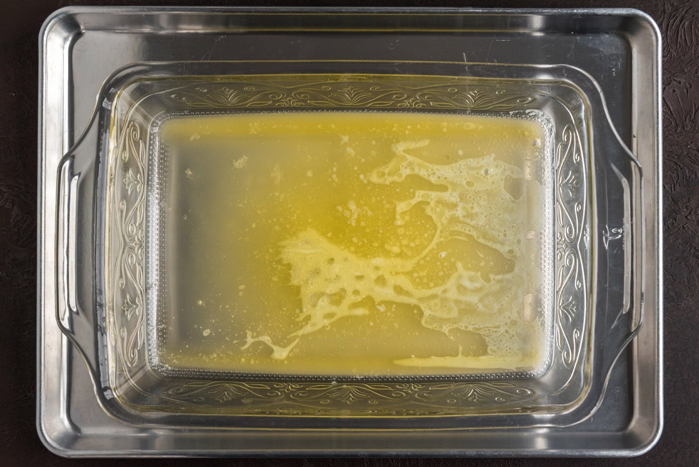 melted butter in baking dish