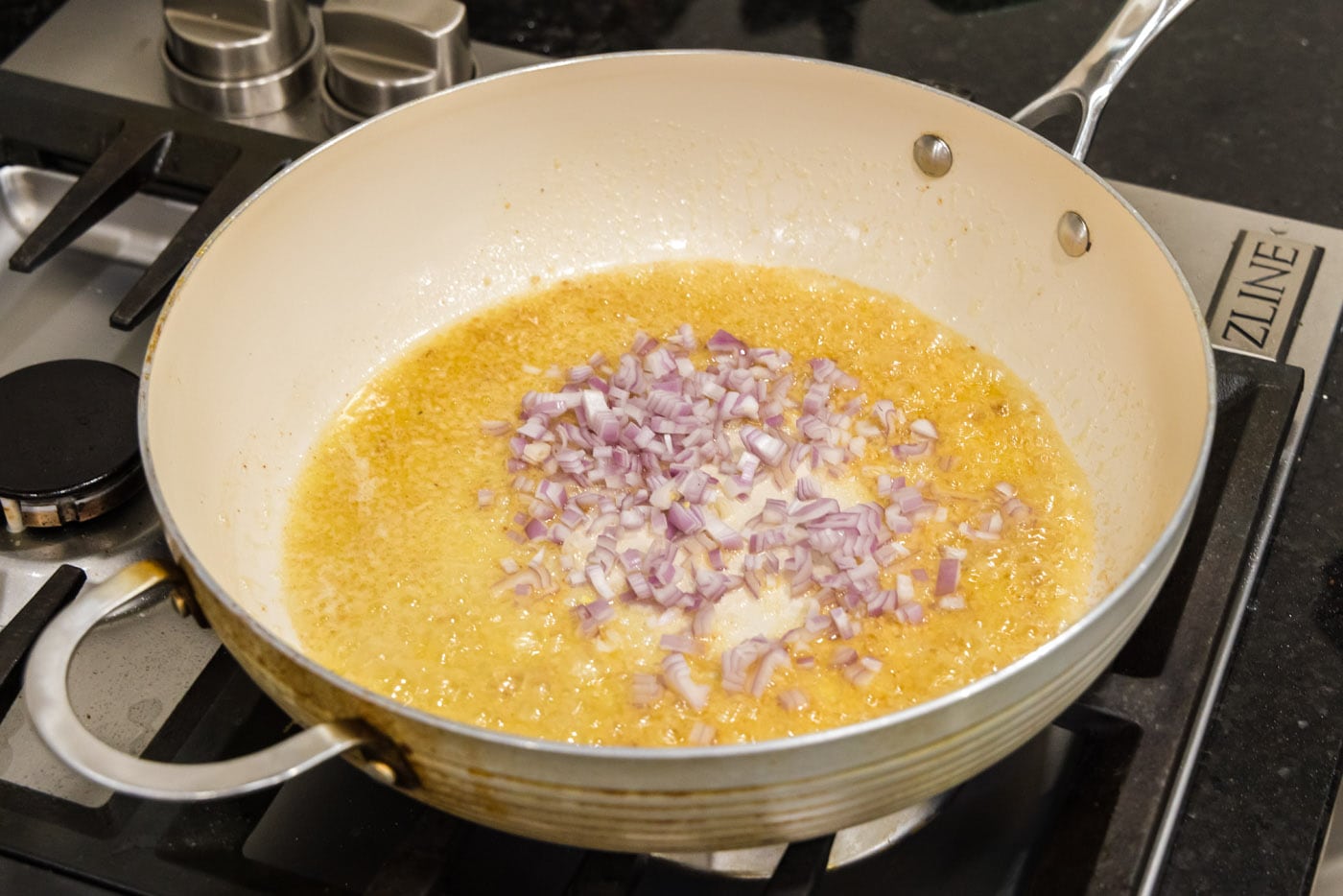 melted butter, garlic, and shallots in a skillet
