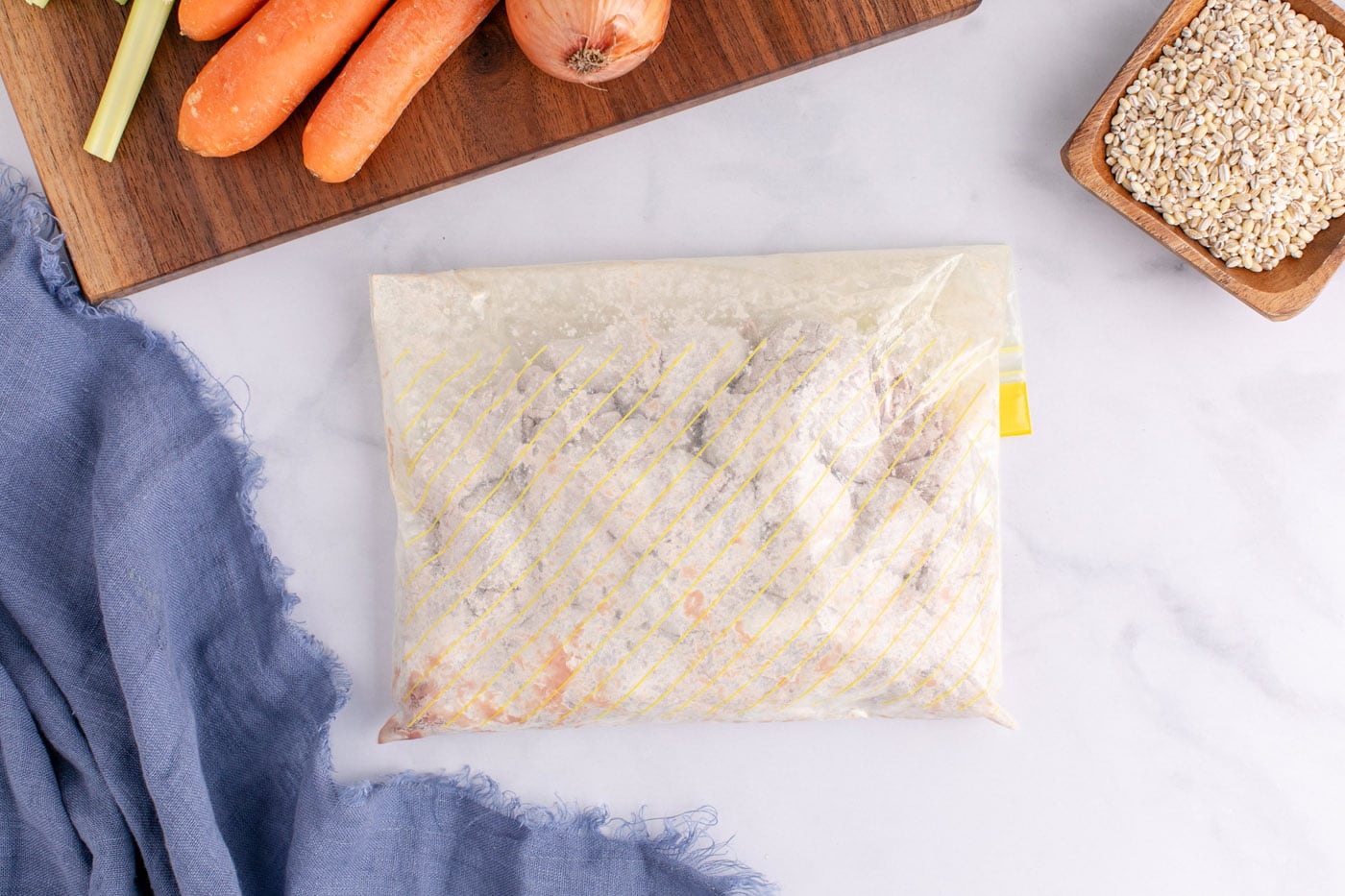 ziploc bag with flour coated beef cubes