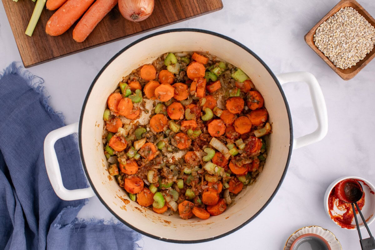 cooked vegetables in a soup pot