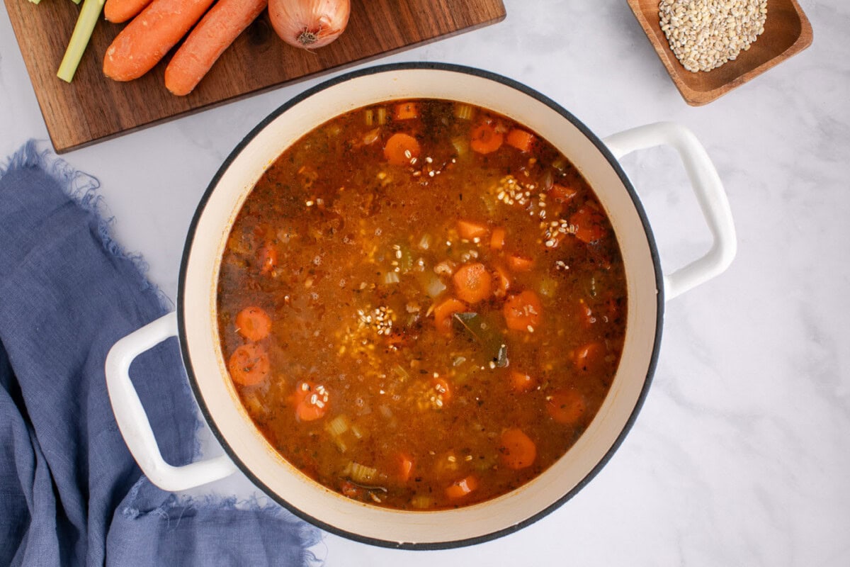 beef barley soup cooking in a stock pot