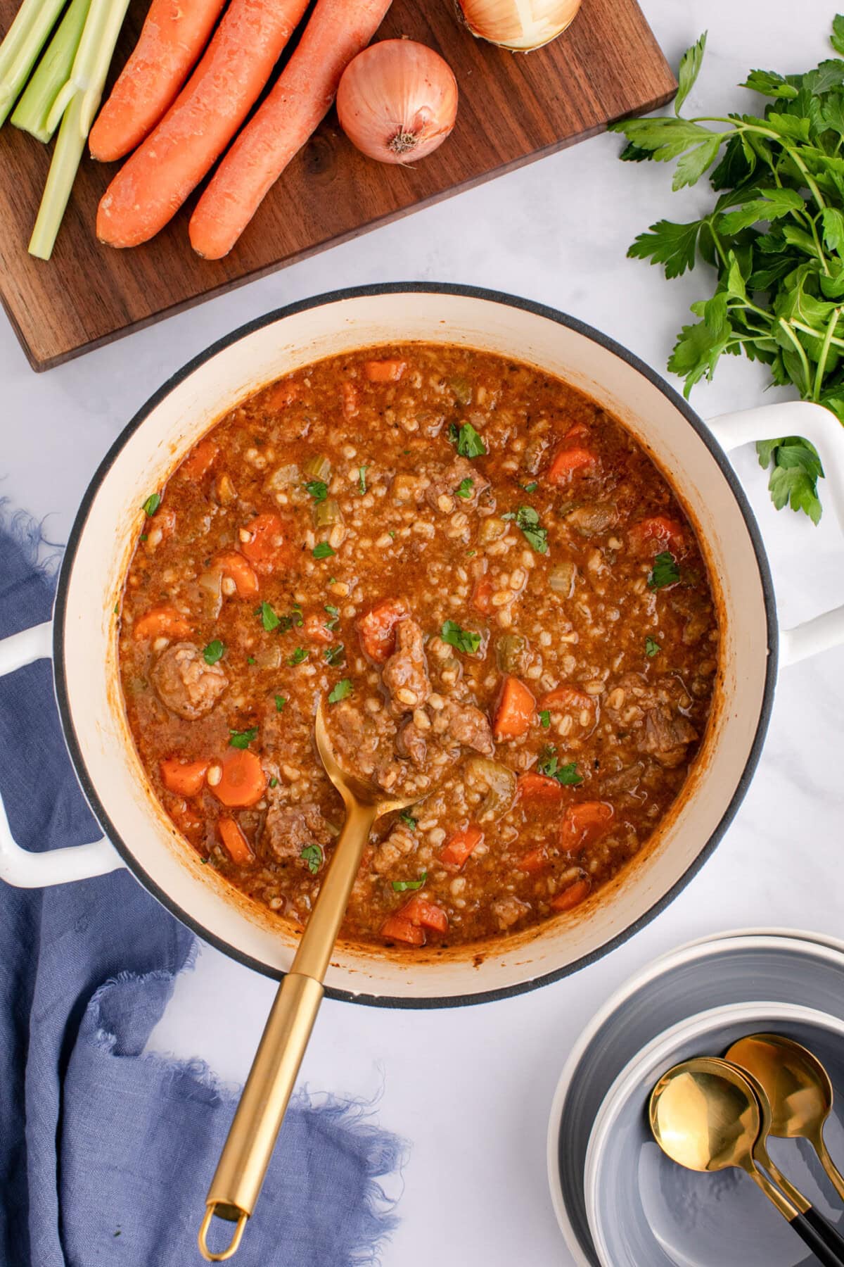 Pot of Beef Barley Soup with a spoon in it