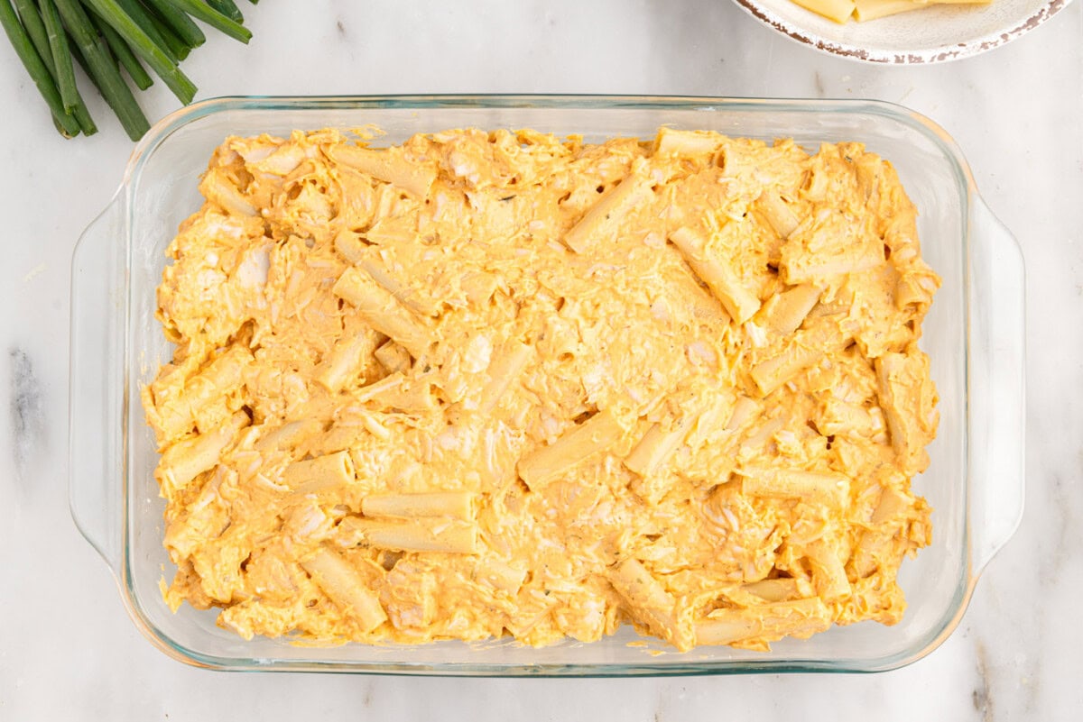 buffalo chicken pasta casserole in a dish
