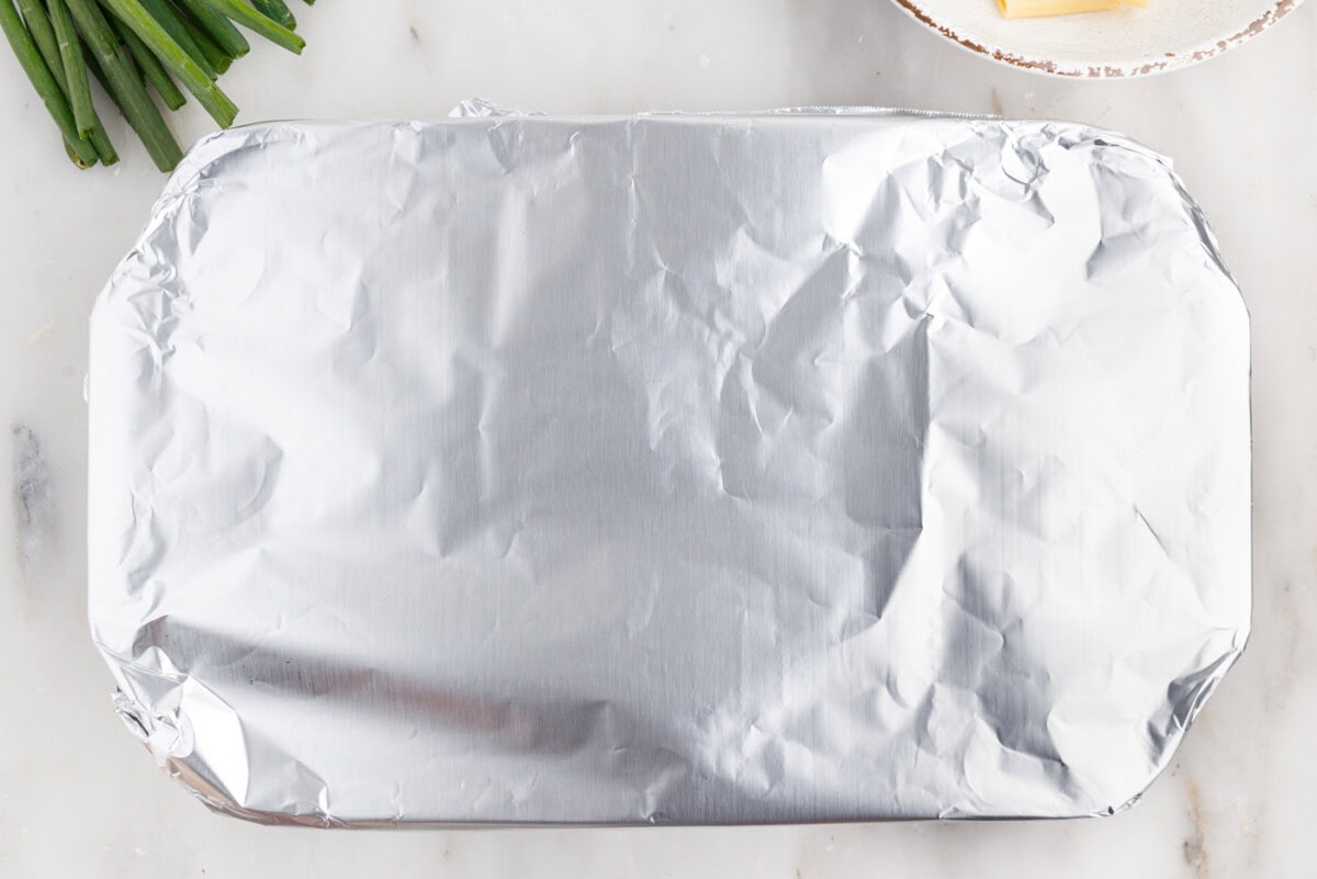 foil covering buffalo chicken casserole