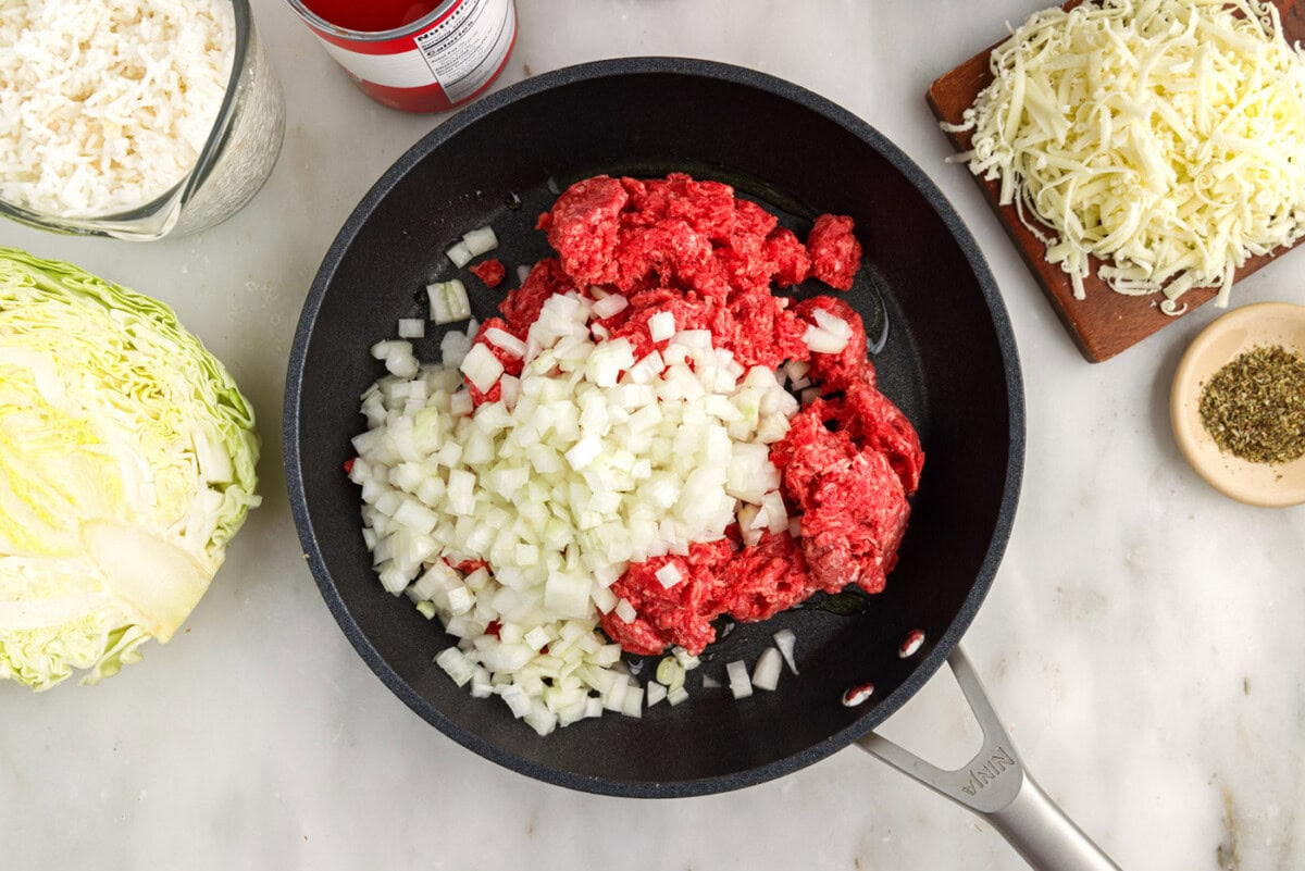 ground beef and onion in a skillet