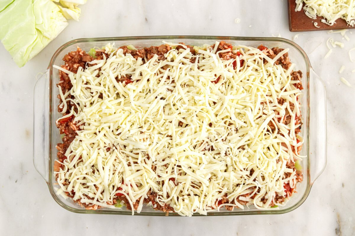 shredded cheese on top of cabbage roll casserole