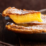 Slice of Chess Pie being lifted out of the pie
