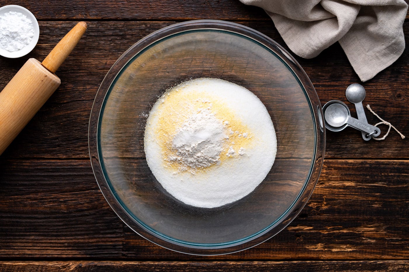 sugar, cornmeal, flour, and salt in a bowl