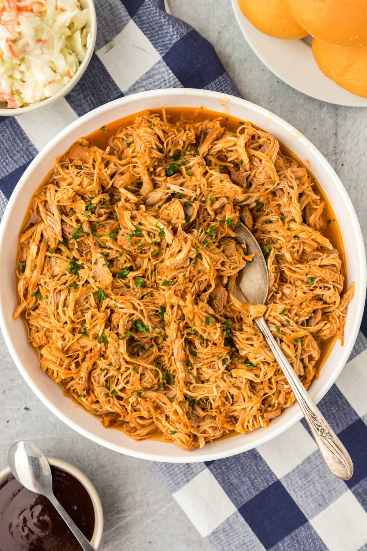 Overhead photo of Instant Pot BBQ Chicken with a spoon in it