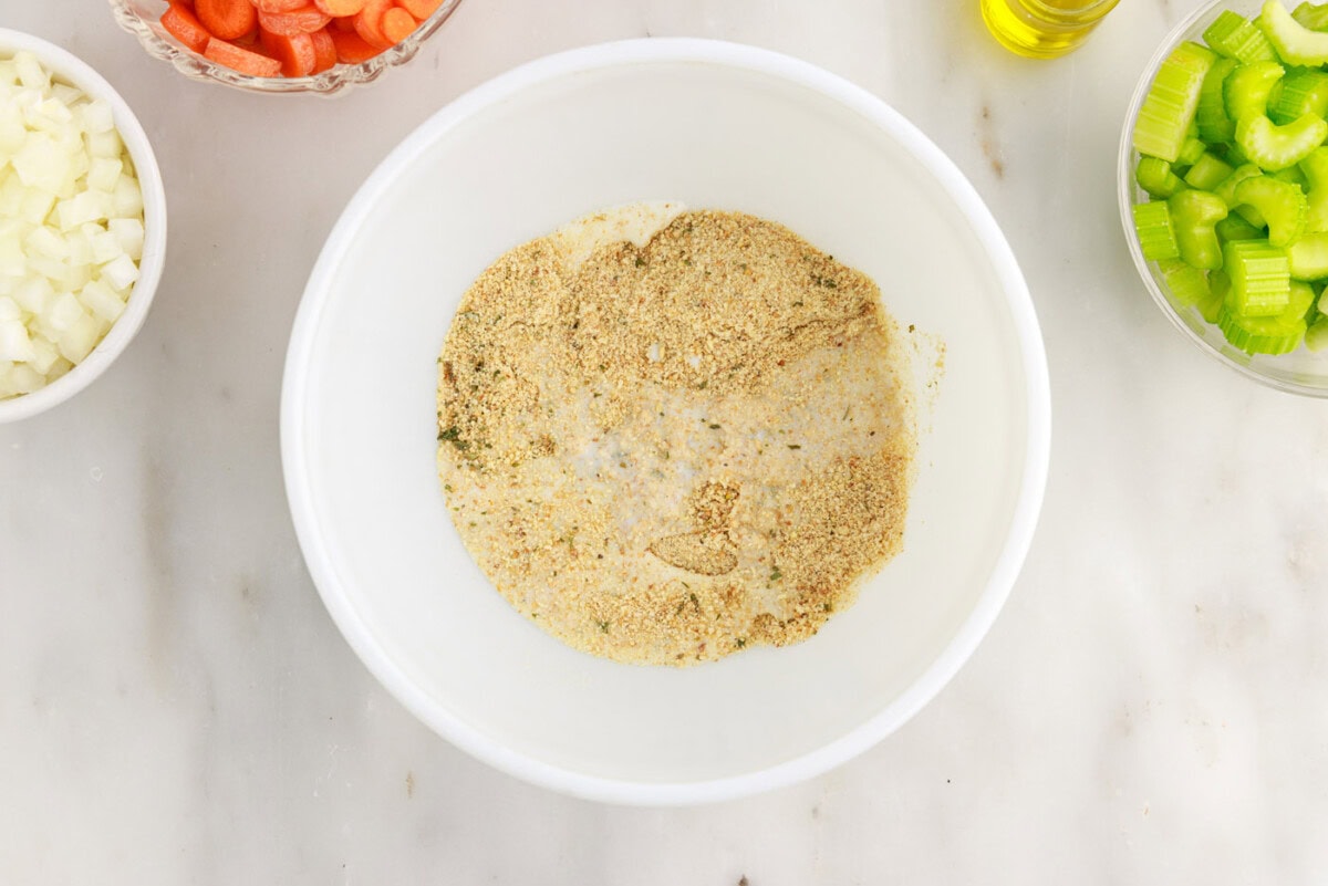 breadcrumbs in bowl with milk