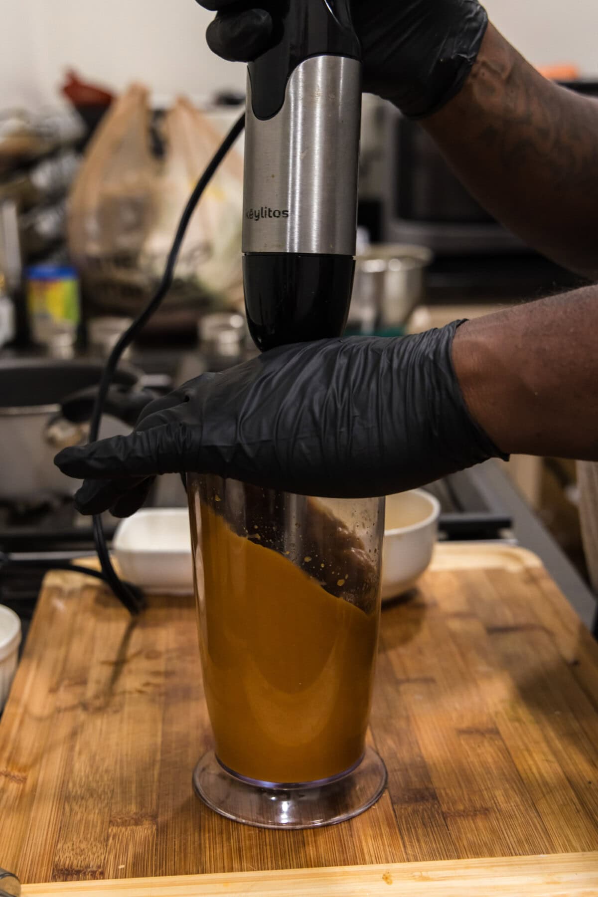 blitzing miso glaze in an immersion blender