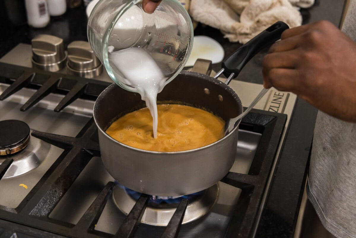 pouring cornstarch slurry into miso glaze