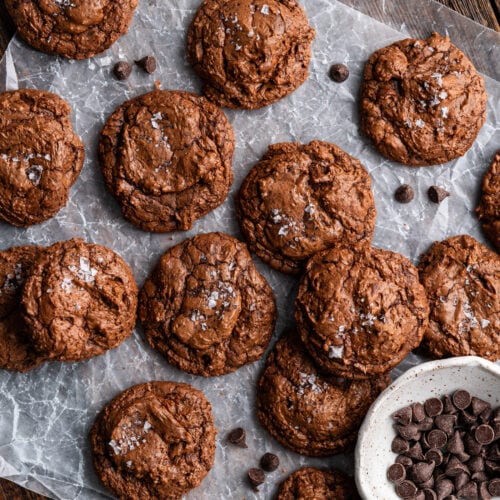 Salted Brownie Cookies with chocolate chips scattered around