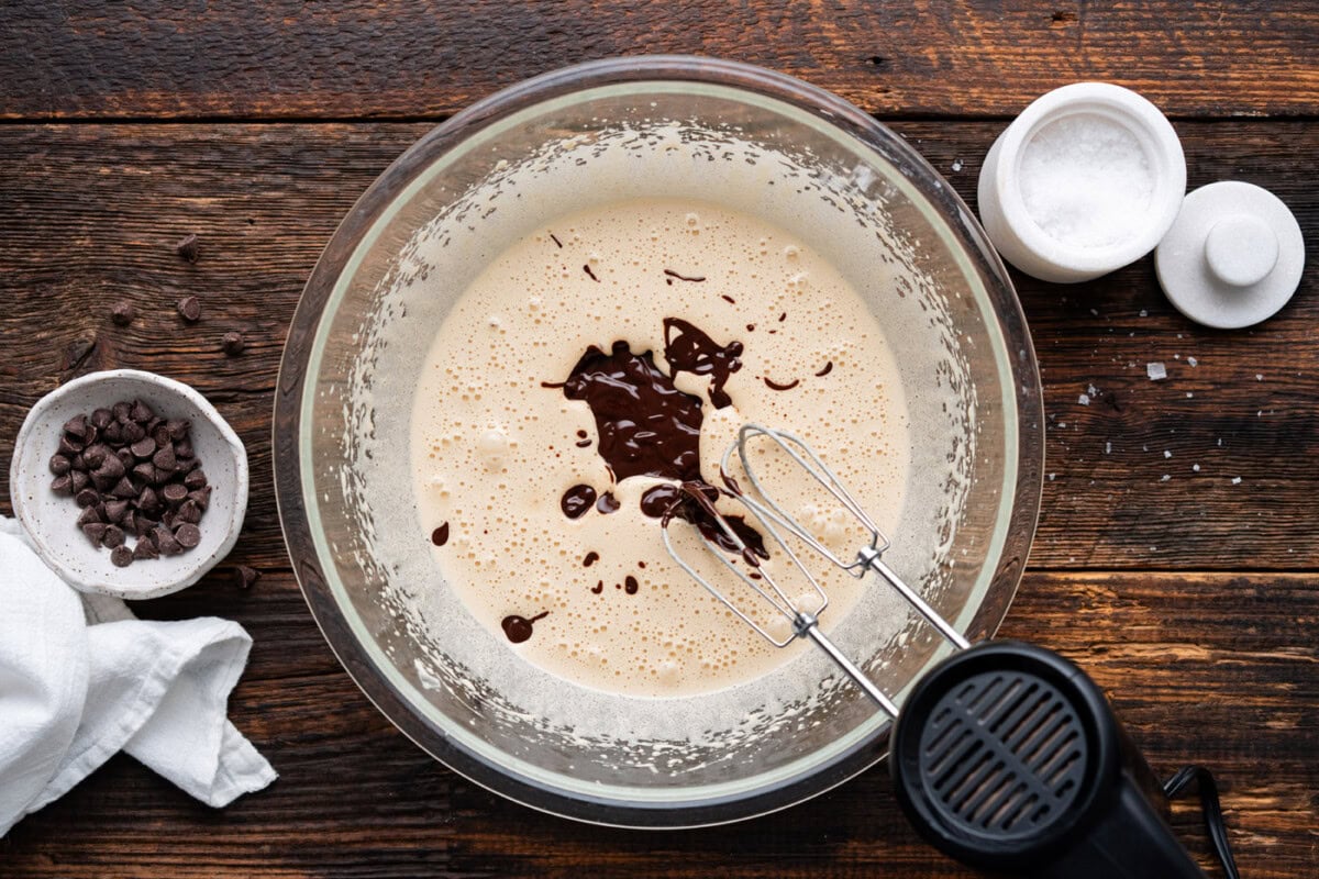 beating cookie dough mixture with a hand mixer