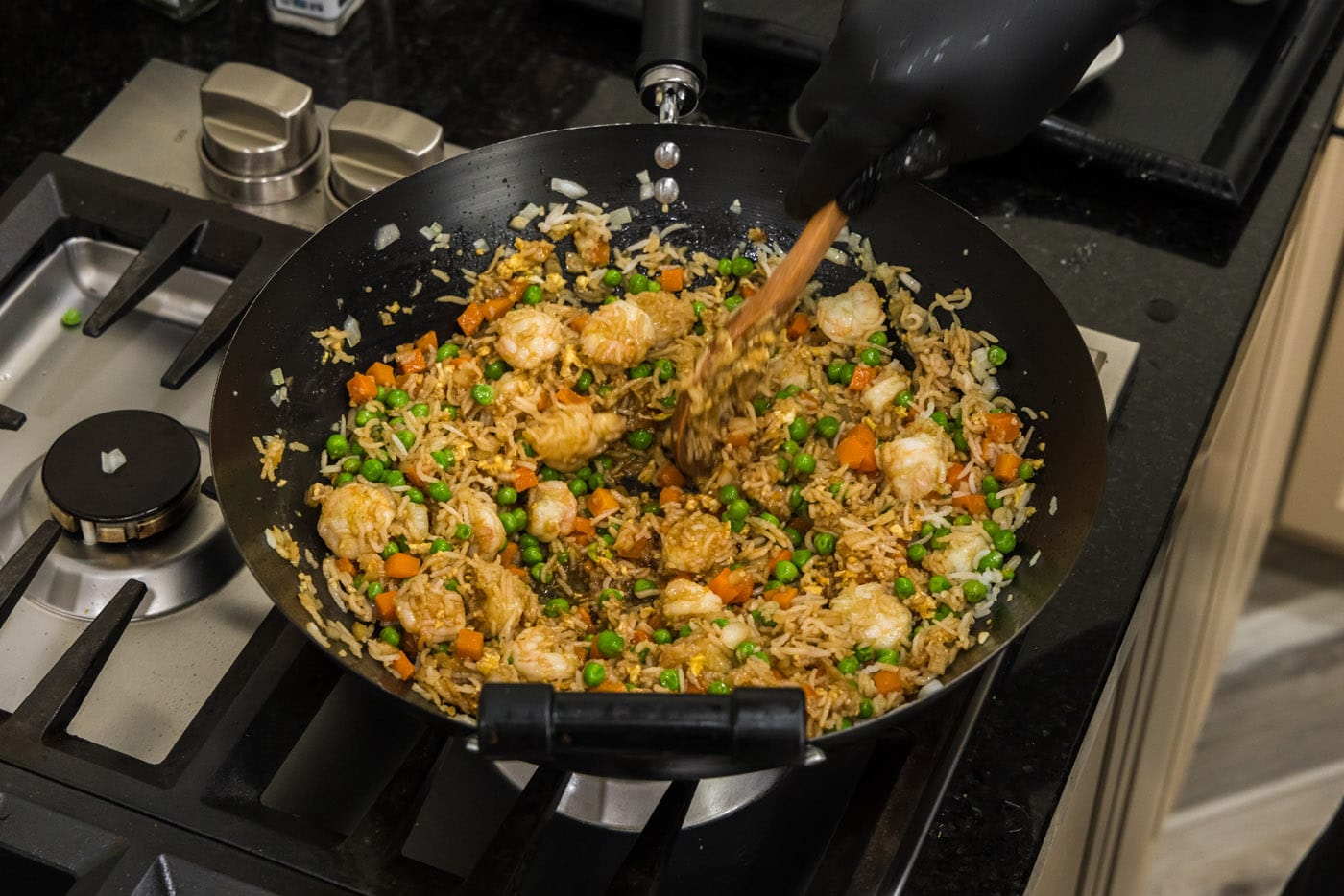shrimp fried rice in a wok